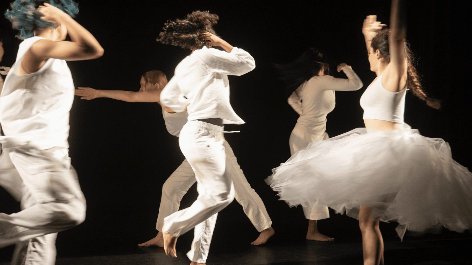 Pictured: Lang Dance students performing Continuous Replay by Bill T. Jones and Arnie Zane
in Spring 2023. Photo credit: Frank Mullaney